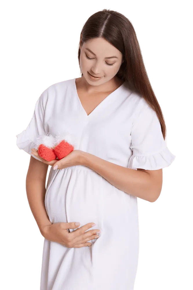 gently-pregnant-woman-with-red-booties-touching-her-belly